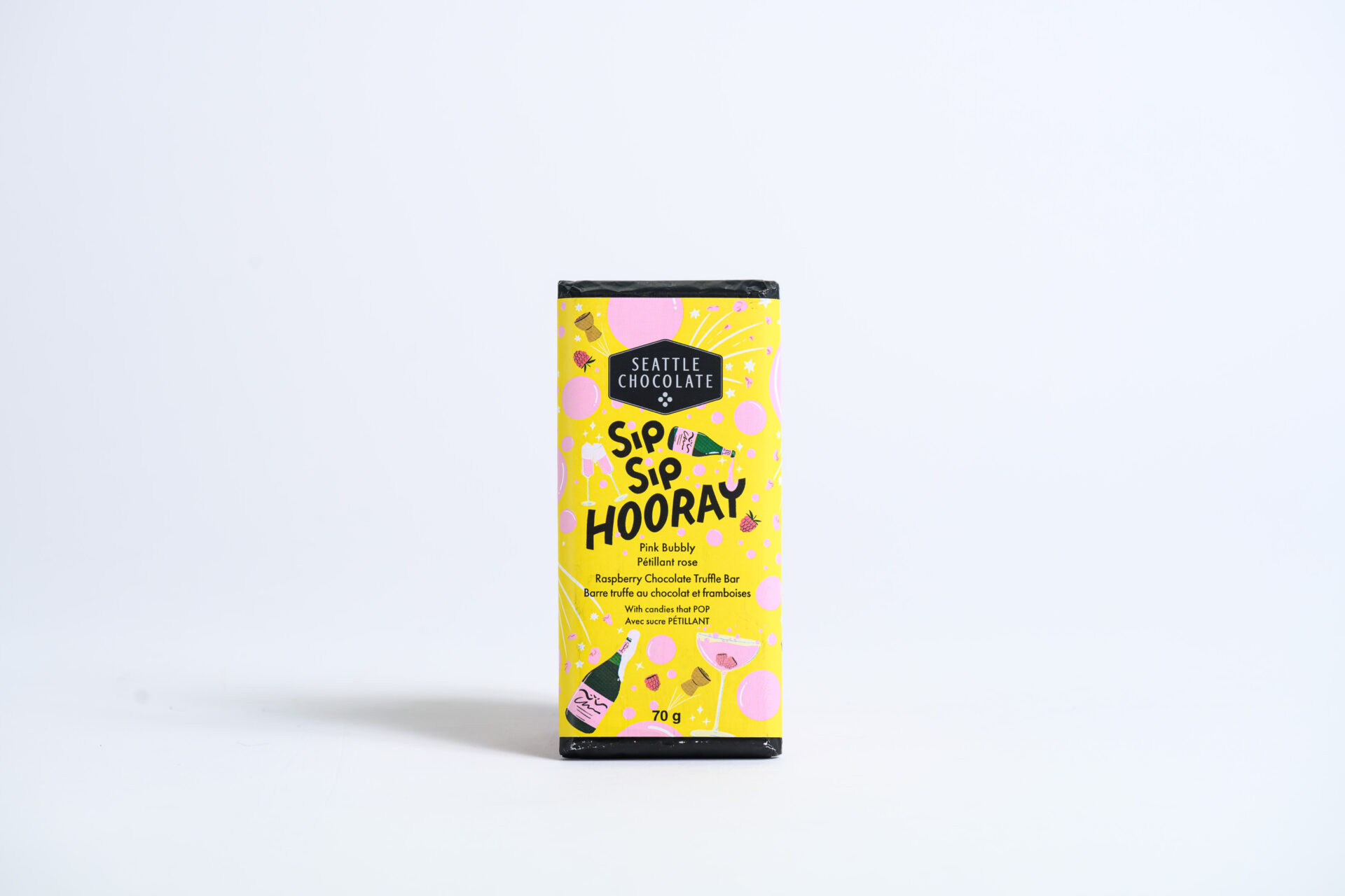 Yellow packaged chocolate with black borders on top and bottom with a white background.