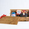 Small wooden box with products for Tea Enthusiasts.