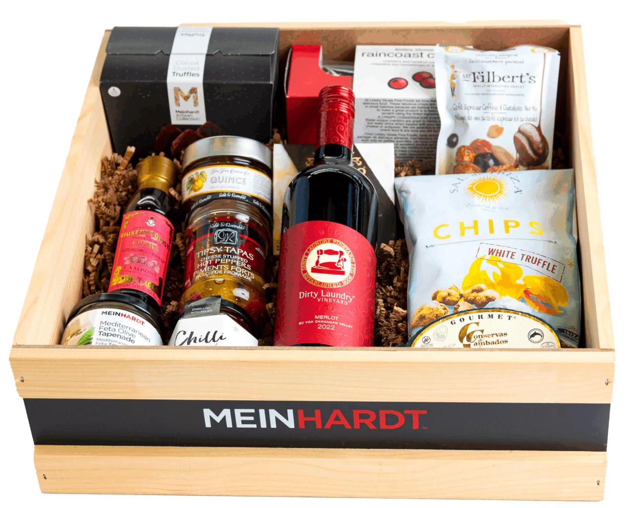 Snacks and Treats packed in a wooden crate with one red wine in the front. The wooden crate is faded Beige color with a black strip and has Meinhardt written on it.