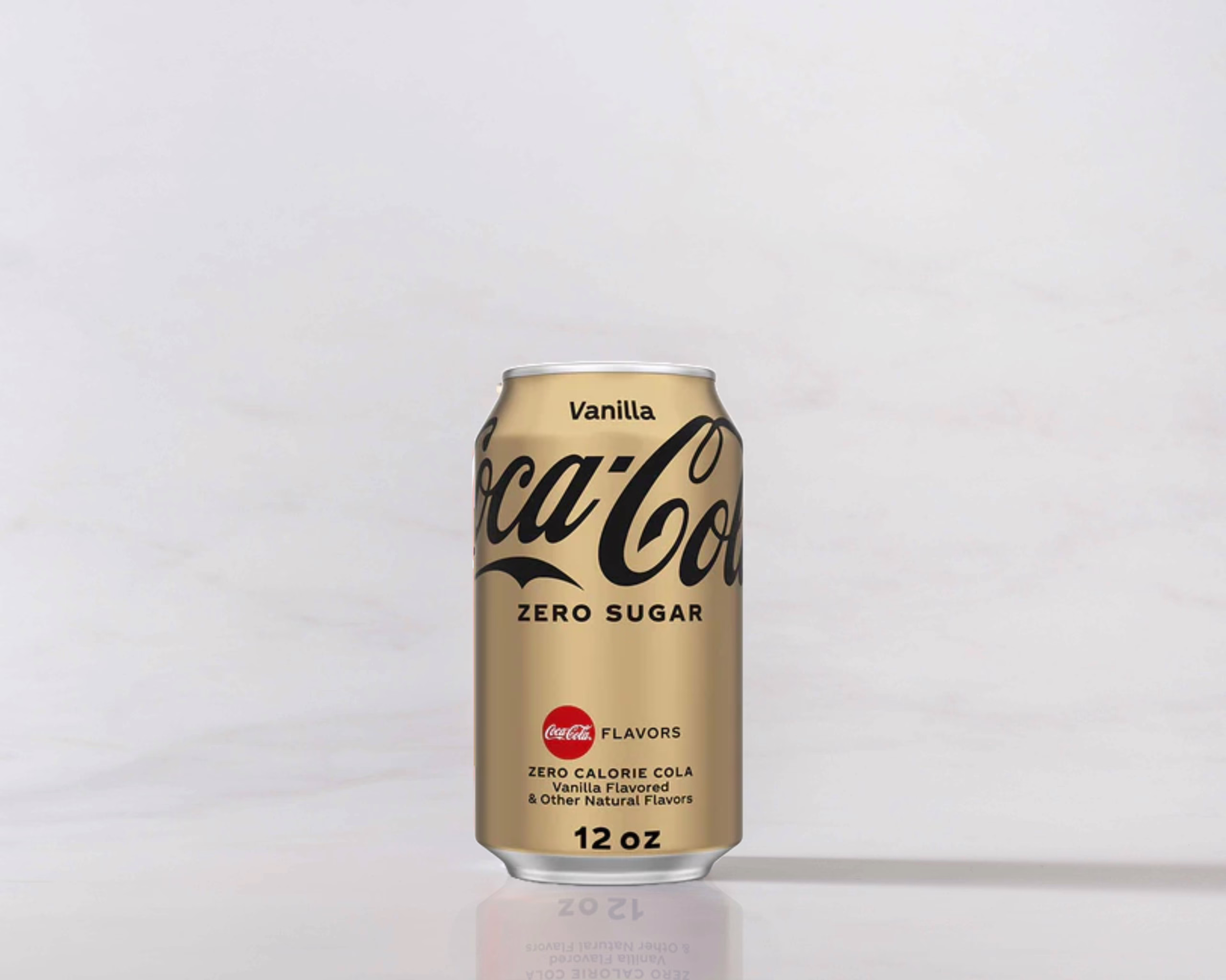 A can of Vanilla Coke Zero on a table with a shadow to the right. Theme white marble.