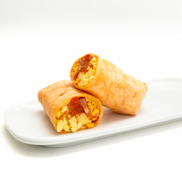 Cheddar flour tortilla wrap with Chorizo, Cheddar Cheese, Scrambled eggs inside presented on a white plate