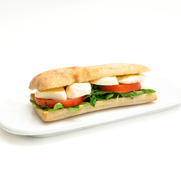 Ciabatta pan bread, pesto mayonaisse, arugula, bocconcini, tomoato, basil, salt and pepper.