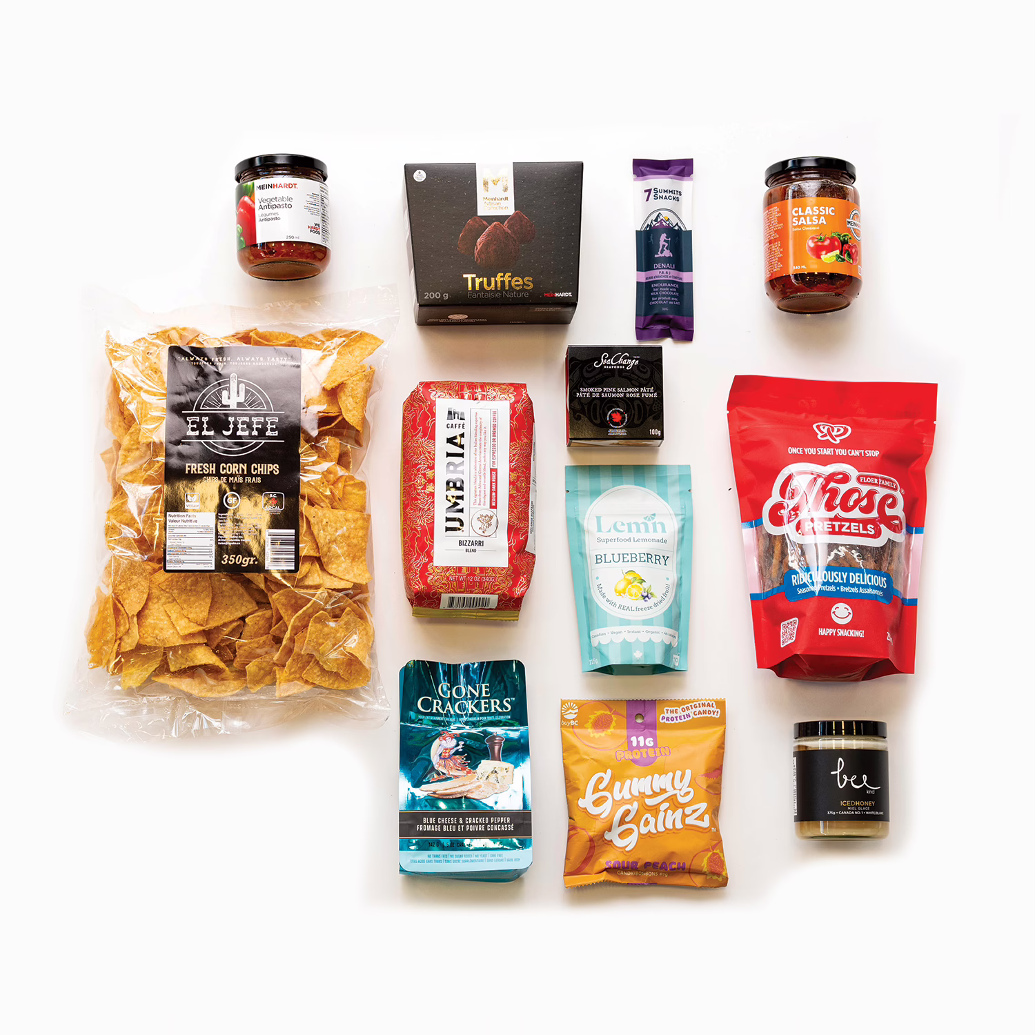 BestoftheWestContents_Christmas Best of West gourmet gift basket items spread with Canadian artisan foods and BC-made treats.